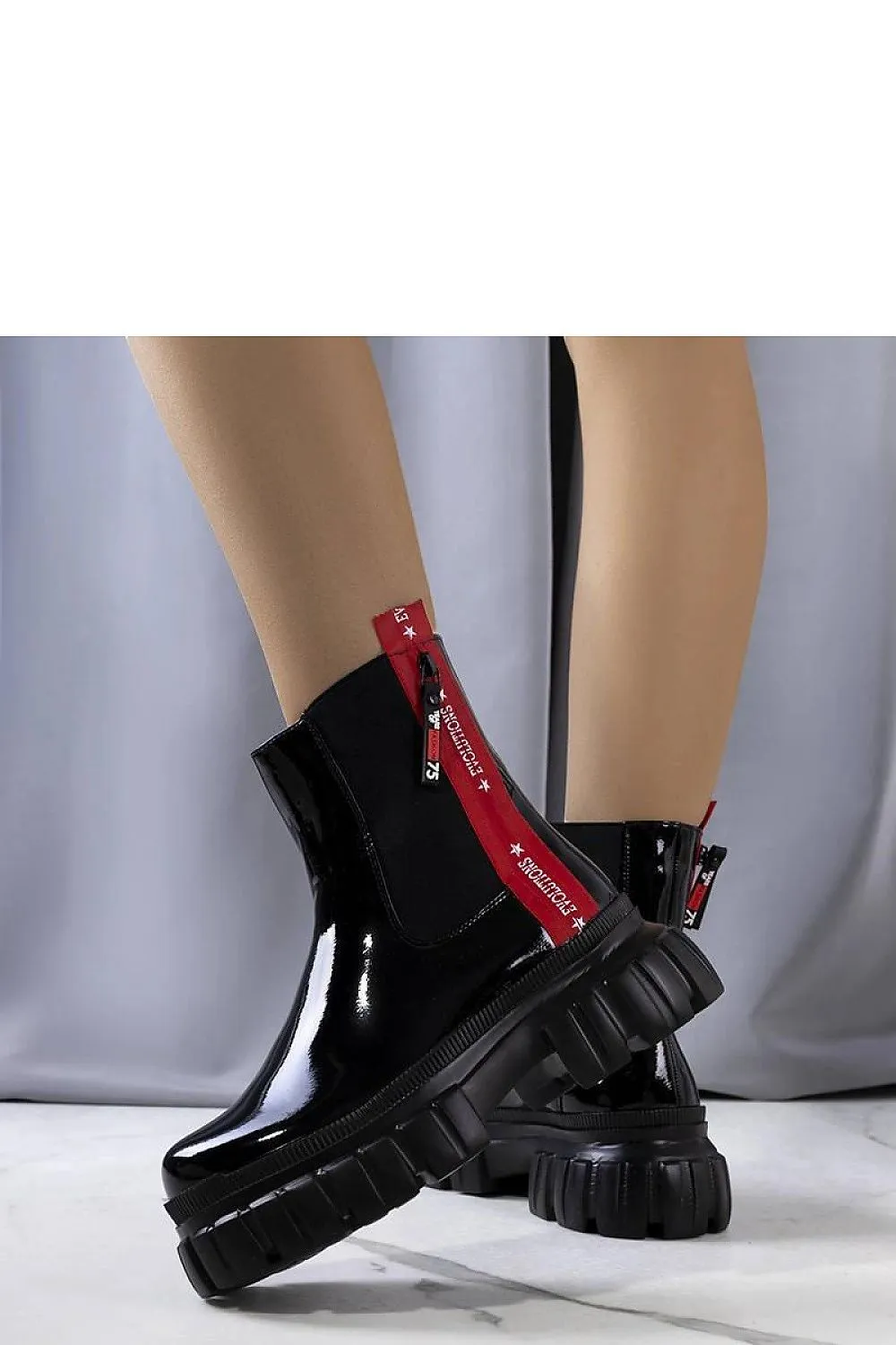 Black patent leather ankle boots