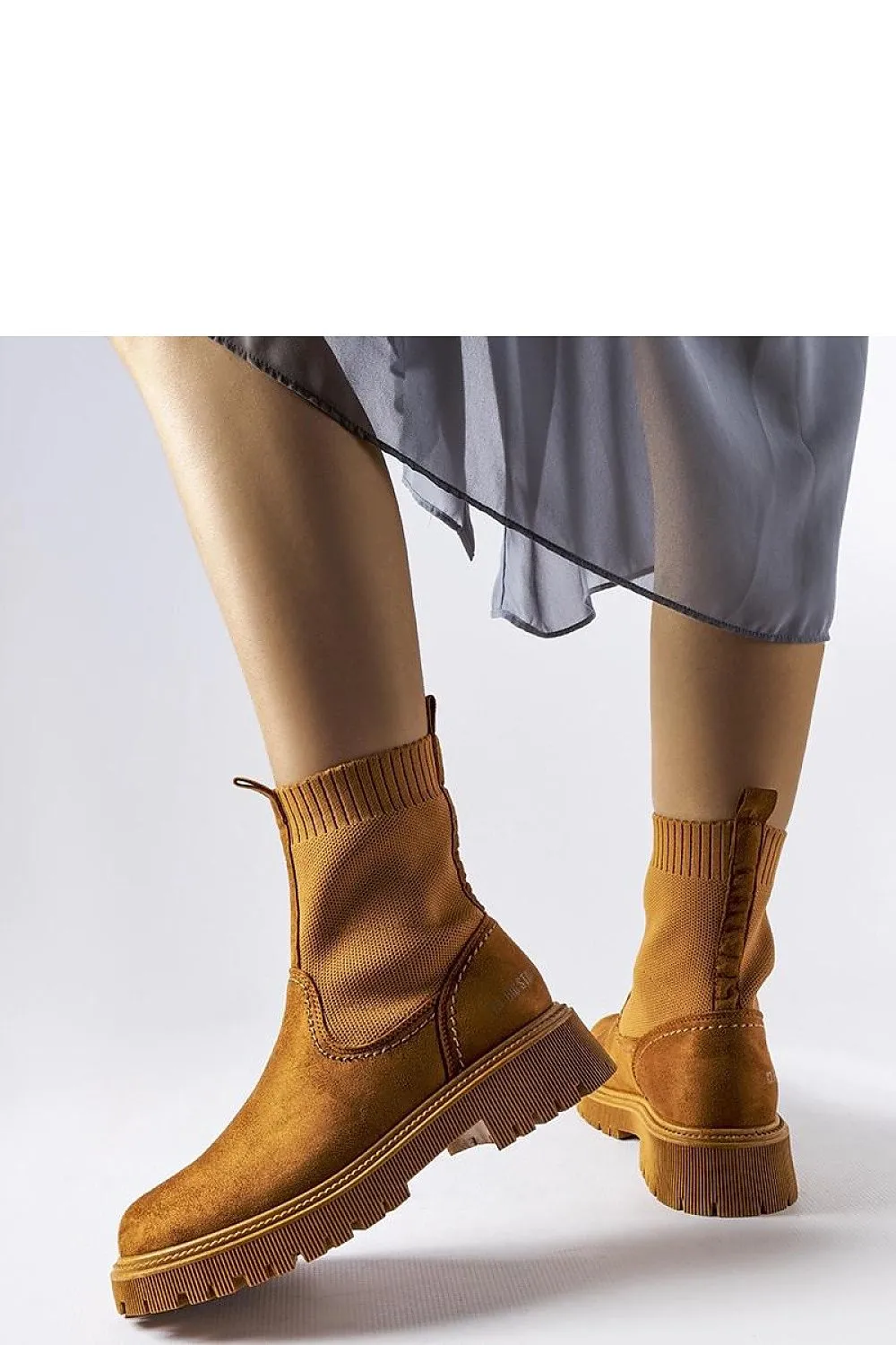 Brown slip-on design boots